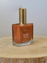 Load image into Gallery viewer, Huile pailletée OR DE TAHITI corps & cheveux - 50ml - OXALIA