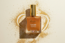Charger l'image dans la galerie, Huile Pailletée Corps & Cheveux Or de Tahiti – Carotte & Paillettes Dorées – 50ml – Oxalia